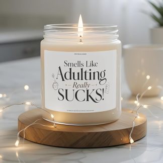 Funny “Smells Like Adulting Really Sucks” 9 oz soy candle label with elegant black typography, tired mug illustration, checklist icon, and minimalist white design.