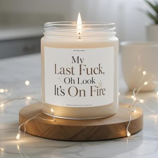 Funny “My Last Fuck Oh Look It’s On Fire” 9 oz soy candle label with elegant brown and black typography, small flame icon, gold accent, and minimalist neutral design.